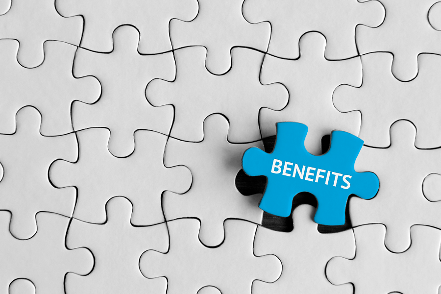 Benefits puzzle piece, fitting into a puzzle.