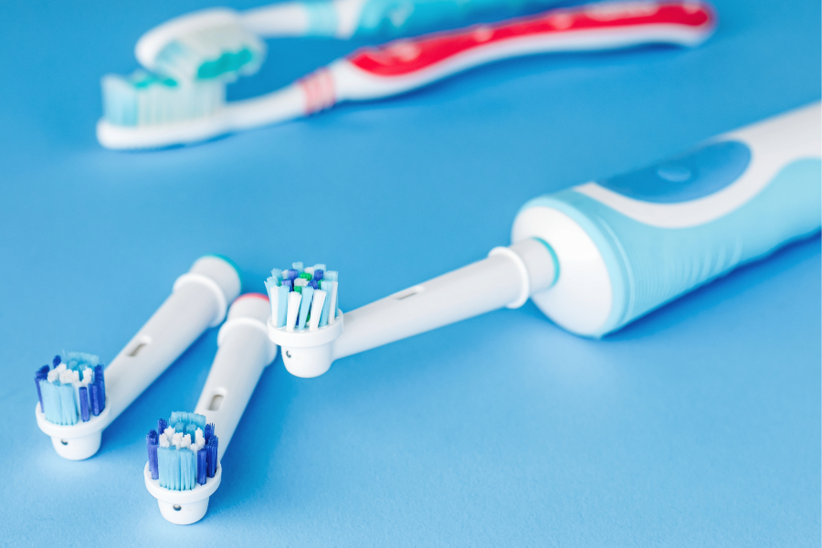 image of electric toothbrush and replacement heads